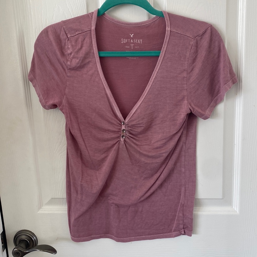 Red V-neck shirt